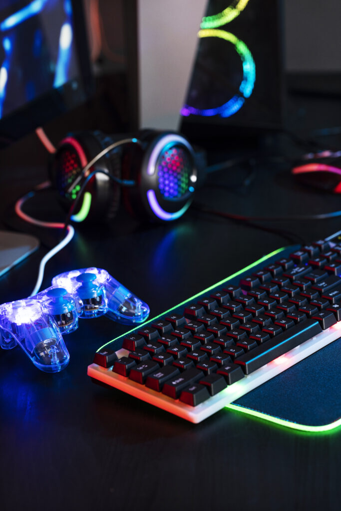 gradient-view-illuminated-neon-gaming-desk-setup-with-keyboard (1)